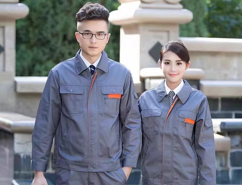Crew wearing DYEWAVE custom grey and orange work uniform sets
